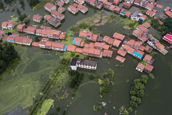 Các ngôi nhà bị ngập lụt do mực nước sông Dương Tử (Trung Quốc) dâng cao Các ngôi nhà bị ngập lụt do mực nước sông Dương Tử (Trung Quốc) dâng cao - Sputnik Việt Nam