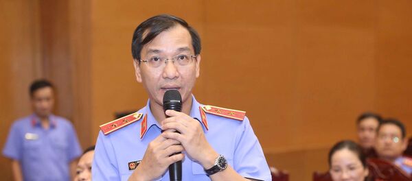 Đồng chí Hồ Đức Anh, Kiểm sát viên Viện Kiểm sát nhân dân tối cao, Vụ trưởng Vụ 7 trả lời các câu hỏi của phóng viên. - Sputnik Việt Nam