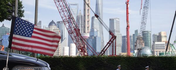 Cờ Hoa Kỳ gần một khách sạn ở Thượng Hải, Trung Quốc Cờ Hoa Kỳ gần một khách sạn ở Thượng Hải, Trung Quốc - Sputnik Việt Nam