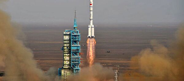 Vụ phóng tàu vũ trụ Thần Châu-9 với sự hỗ trợ của phương tiện phóng Changzheng 2F, Trung Quốc. - Sputnik Việt Nam