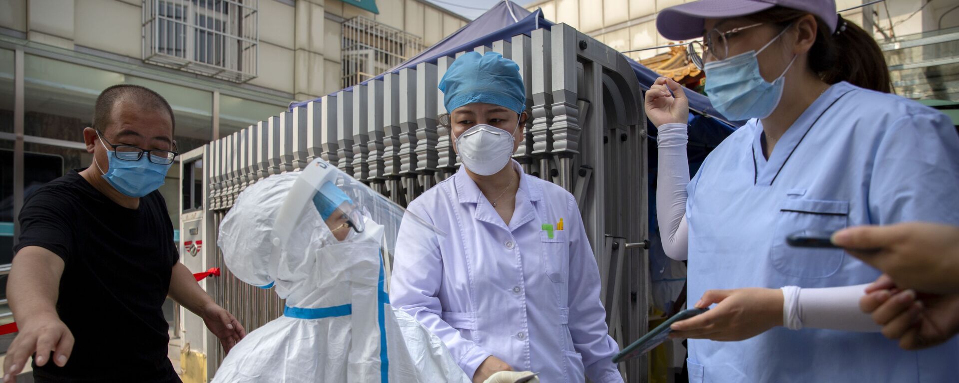 Nhân viên y tế Trung Quốc xét nghiệm coronavirus - Sputnik Việt Nam, 1920, 09.09.2020