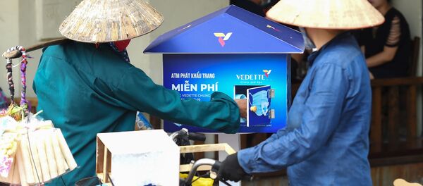 Những người bán khẩu trang miễn phí ở Hà Nội, Việt Nam - Sputnik Việt Nam