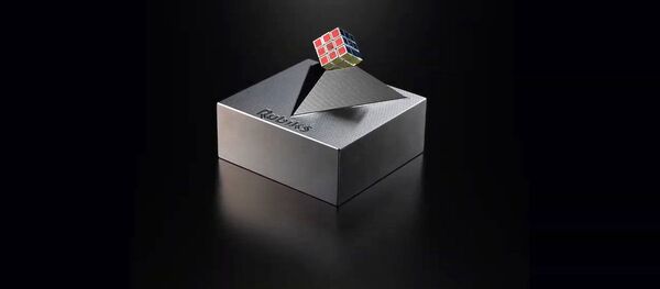 Khối Rubik nhỏ nhất thế giới MegaHouse Corp. Khối Rubik nhỏ nhất thế giới MegaHouse Corp. - Sputnik Việt Nam