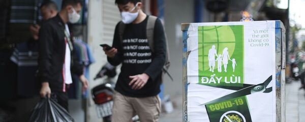 Những người đeo mặt nạ trên đường phố Hà Nội - Sputnik Việt Nam