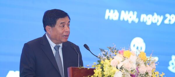 Bộ trưởng Bộ Kế hoạch và Đầu tư Nguyễn Chí Dũng phát biểu tại diễn đàn. - Sputnik Việt Nam