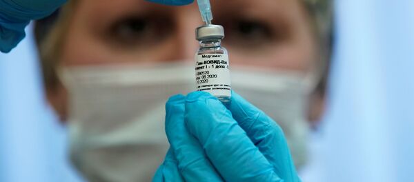 Y tá tiêm vắc xin Sputnik-V Y tá tiêm vắc xin Sputnik-V - Sputnik Việt Nam