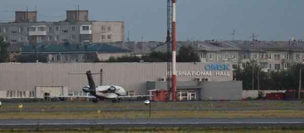 Máy bay Bombardier Challenger 604 FAI Aviation Group hạ cánh xuống thành phố Omsk - Sputnik Việt Nam