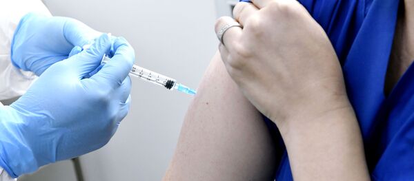 Tiêm vắc xin chống lại coronavirus. - Sputnik Việt Nam