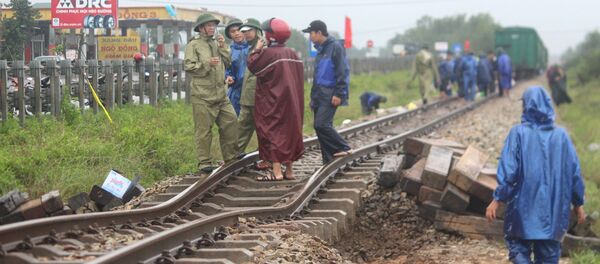 Hiện trường sự cố do mưa lũ trên tuyến đường sắt Bắc-Nam đoạn qua tỉnh Quảng Trị. - Sputnik Việt Nam