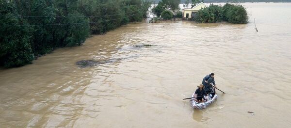 Nước vẫn dâng cao tại xã Hàm Ninh, huyện Quảng Ninh, tỉnh Quảng Bình. - Sputnik Việt Nam