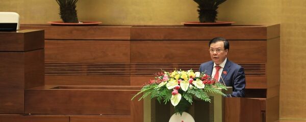 Bộ trưởng Bộ Tài chính Đinh Tiến Dũng, thừa ủy quyền của Thủ tướng Chính phủ trình bày Báo cáo kết quả thực hiện ngân sách nhà nước năm 2020, dự toán ngân sách nhà nước và phương án phân bổ ngân sách trung ương năm 2021; kết quả thực hiện kế hoạch tài chính 5 năm quốc gia giai đoạn 2016-2020; dự kiến kế hoạch tài chính 5 năm quốc gia giai đoạn 2021-2025.  - Sputnik Việt Nam