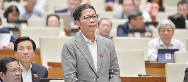 Bộ trưởng Bộ Công thương Trần Tuấn Anh giải trình làm rõ vấn đề Đại biểu Quốc hội nêu. Bộ trưởng Bộ Công thương Trần Tuấn Anh giải trình làm rõ vấn đề Đại biểu Quốc hội nêu. - Sputnik Việt Nam