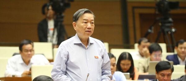 Đại tướng Tô Lâm, Bộ trưởng Bộ Công an trả lời câu hỏi chất vấn. - Sputnik Việt Nam