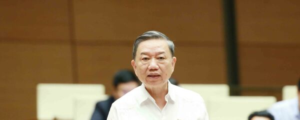 Đại tướng Tô Lâm, Bộ trưởng Bộ Công an trả lời chất vấn của đại biểu Quốc hội. - Sputnik Việt Nam