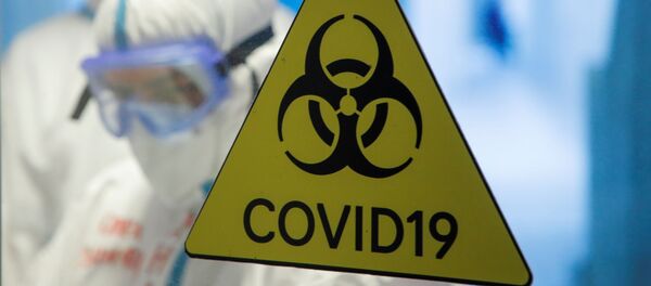 Dấu hiệu nguy hiểm sinh học tại bệnh viện tạm thời ở Cung thể thao băng Krylatskoye - Sputnik Việt Nam