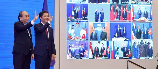 Thủ tướng Nguyễn Xuân Phúc, Chủ tịch ASEAN 2020 và Bộ trưởng Bộ Công Thương Trần Tuấn Anh và các nước tham dự lễ ký Hiệp định Đối tác Kinh tế Toàn diện Khu vực RCEP Thủ tướng Nguyễn Xuân Phúc, Chủ tịch ASEAN 2020 và Bộ trưởng Bộ Công Thương Trần Tuấn Anh và các nước tham dự lễ ký Hiệp định Đối tác Kinh tế Toàn diện Khu vực RCEP - Sputnik Việt Nam