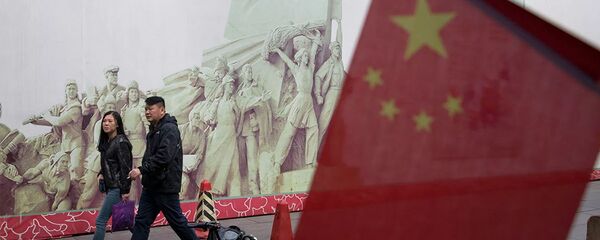 Người mua sắm trong trung tâm mua sắm ở Bắc Kinh Người mua sắm trong trung tâm mua sắm ở Bắc Kinh - Sputnik Việt Nam