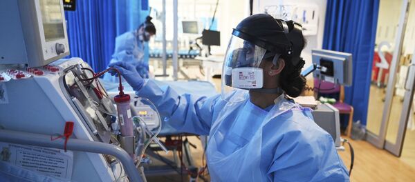 Hỗ trợ một bệnh nhân được chẩn đoán mắc bệnh coronavirus tại bệnh viện, Vương quốc Anh Hỗ trợ một bệnh nhân được chẩn đoán mắc bệnh coronavirus tại bệnh viện, Vương quốc Anh - Sputnik Việt Nam