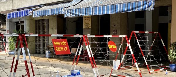 Một phần chung cư được lực lượng chức năng phong toả. Một phần chung cư được lực lượng chức năng phong toả. - Sputnik Việt Nam