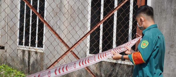 Khu vực nhà trọ của bệnh nhân được cơ quan chức năng Quận 9 phong tỏa. - Sputnik Việt Nam