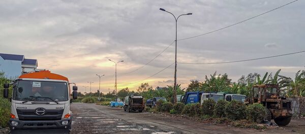 Bãi tập kết rác trong khu tái định cư Thới Nhựt 2, phường An Khánh, quận Ninh Kiều bị người dân phản ánh gây ô nhiễm môi trường. Bãi tập kết rác trong khu tái định cư Thới Nhựt 2, phường An Khánh, quận Ninh Kiều bị người dân phản ánh gây ô nhiễm môi trường. - Sputnik Việt Nam