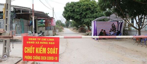 Chốt kiểm dịch tại thôn Kim Điền, xã Hưng Đạo, thành phố Chí Linh chiều 28/1. - Sputnik Việt Nam