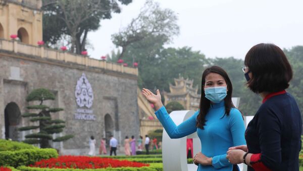 Ngày 8/3/2021, khu di sản Hoàng thành Thăng Long mở cửa đón khách trở lại và thực hiện nghiêm các quy định phòng chống dịch. - Sputnik Việt Nam