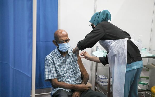 Tiêm chủng vaccine ở Malaysia. - Sputnik Việt Nam