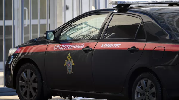 Xe công vụ gần tòa nhà của Ủy ban Điều tra LB Nga. - Sputnik Việt Nam