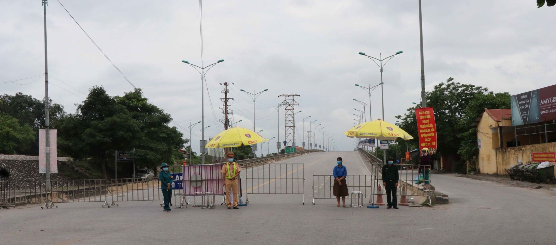 Chốt kiểm soát dịch bệnh COVID-19 tại cầu Như Nguyệt ngăn giữa phường Đáp Cầu, thành phố Bắc Ninh và huyện Việt Yên, tỉnh Bắc Giang - Sputnik Việt Nam, 1920, 25.05.2021