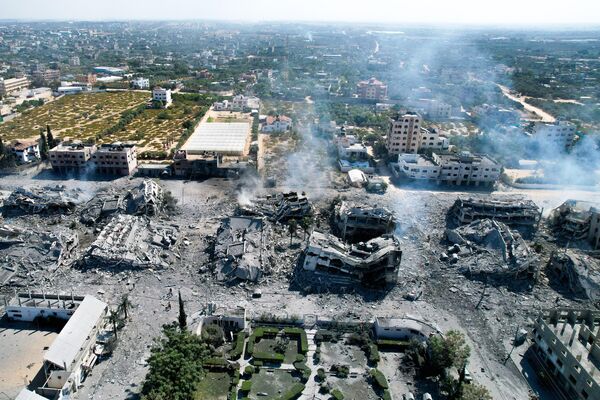 Hình ảnh từ trên không trung cho thấy các tòa nhà bị phá hủy ở thị trấn al-Zahra, phía nam Thành phố Gaza - Sputnik Việt Nam