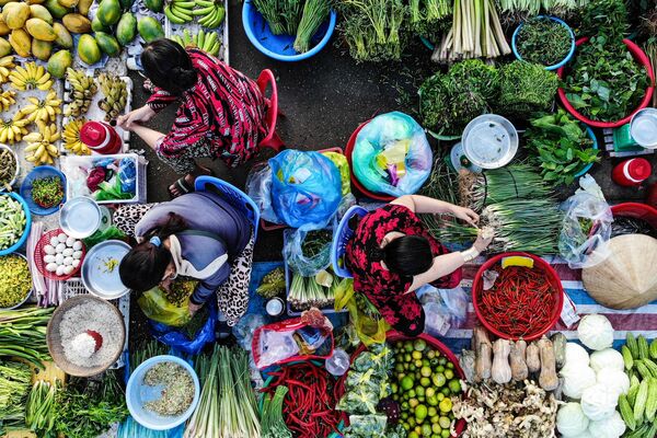 Người bán hàng tại chợ rau quả Vị Thanh, tỉnh Hậu Giang, Việt Nam - Sputnik Việt Nam