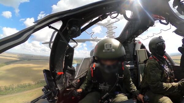 Trực thăng Ka-52 Alligator thực hiện nhiệm vụ chiến đấu đánh thiệt hại các đơn vị Ukraina ở vùng biên giới khu vực Kursk - Sputnik Việt Nam