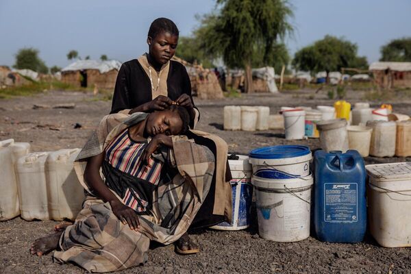 Tác phẩm “Khí hậu thực sự ở Nam Sudan” của nhiếp ảnh gia Anh Luke Dray. Giải Nhì. «Tin chính», loạt ảnh - Sputnik Việt Nam