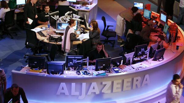 A general view shows the newsroom at the headquarters of the Qatar-based Al-Jazeera satellite channel in Doha  - Sputnik Việt Nam