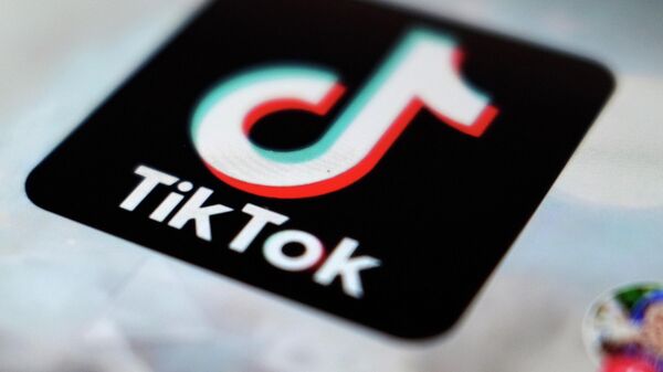 A logo of a smartphone app TikTok is seen on a user post on a smartphone screen Monday, Sept. 28, 2020, in Tokyo.  - Sputnik Việt Nam