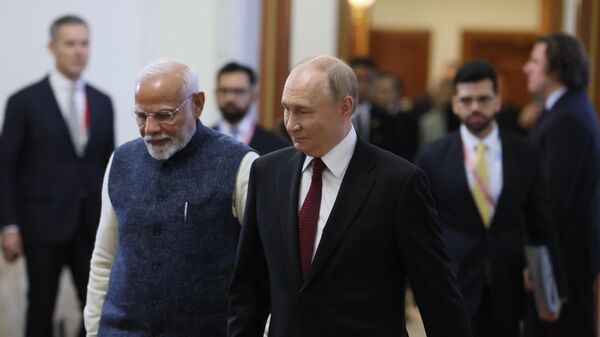 Hội nghị thượng đỉnh BRICS XVI Cuộc gặp giữa Tổng thống Nga Vladimir Putin và Thủ tướng Ấn Độ Narendra Modi - Sputnik Việt Nam