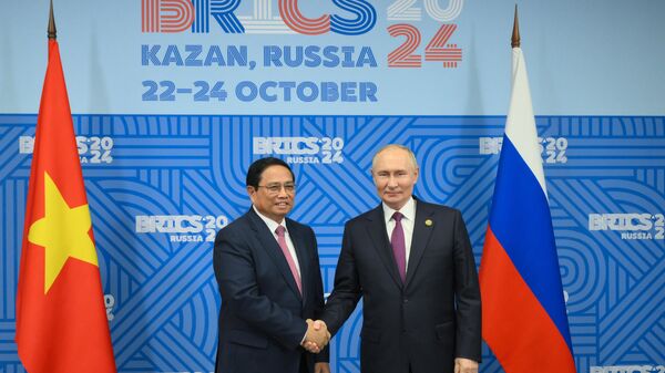 Hội nghị thượng đỉnh BRICS XVI Cuộc gặp giữa Tổng thống Nga Vladimir Putin và Thủ tướng Việt Nam Phạm Minh Chính - Sputnik Việt Nam