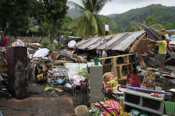 Hậu quả lở đất sau bão Trami ở Philippines - Sputnik Việt Nam