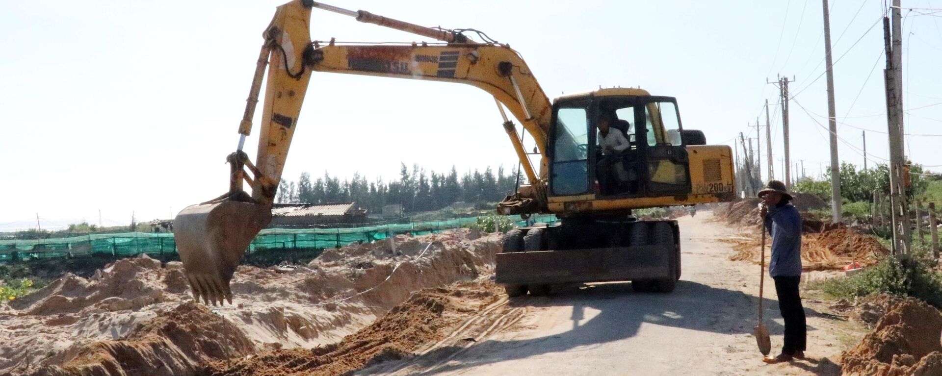 Mở rộng thi công đường giao thông nối tuyến đường ven biển vào xã Phước Dinh (Thuận Nam, Ninh Thuận). - Sputnik Việt Nam, 1920, 15.11.2024