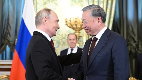 Tổng thống Nga Vladimir Putin và Tổng Bí thư Đảng Cộng sản Việt Nam Tô Lâm trong một cuộc gặp. - Sputnik Việt Nam
