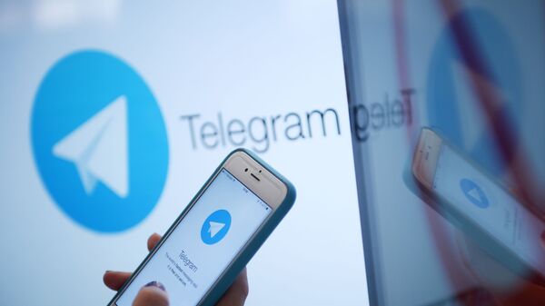 Telegram messenger trên màn hình máy tính và điện thoại - Sputnik Việt Nam