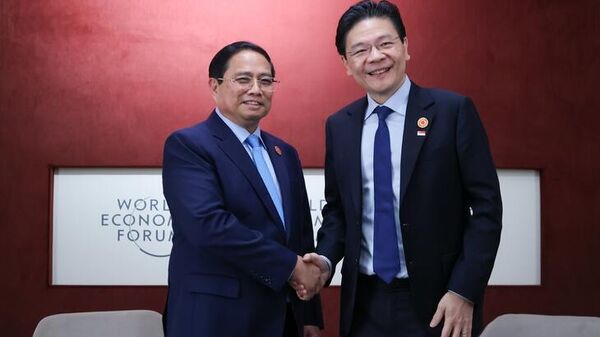 Thủ tướng Phạm Minh Chính và Thủ tướng Singapore Lawrence Wong - Sputnik Việt Nam