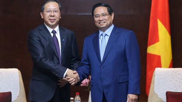 Thủ tướng Phạm Minh Chính tiếp Chủ tịch HĐQT Tập đoàn Khoa học kỹ thuật Huadian (Hoa Điện) Bành Cương Bình - Sputnik Việt Nam