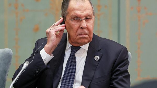 Bộ trưởng Ngoại giao Nga Sergei Lavrov trong cuộc gặp giữa Tổng thống Nga Vladimir Putin và Tổng thống Thổ Nhĩ Kỳ Recep Tayyip Erdogan bên lề hội nghị thượng đỉnh Tổ chức Hợp tác Thượng Hải (SCO) tại Thiên Tân. - Sputnik Việt Nam