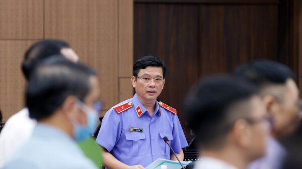 Đại diện Viện Kiểm sát công bố bản cáo trạng đối với các bị cáo - Sputnik Việt Nam