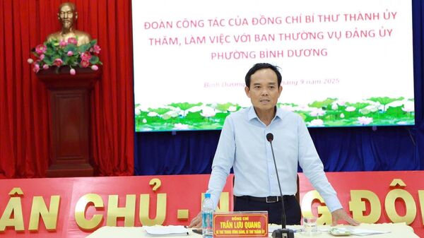 Đồng chí Trần Lưu Quang, Bí thư Trung ương Đảng, Bí thư Thành ủy Thành phố Hồ Chí Minh phát biểu tại buổi làm việ
 - Sputnik Việt Nam