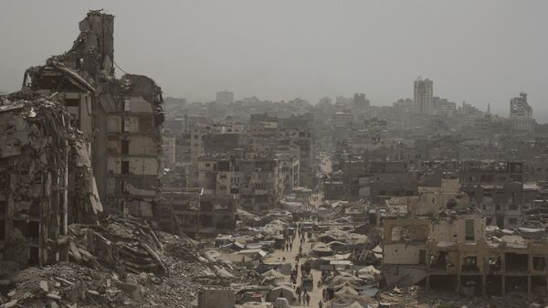 Những tòa nhà bị phá hủy trong cuộc ném bom của Israel vào thành phố Gaza - Sputnik Việt Nam