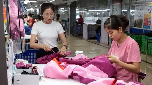 May hàng xuất khẩu sang thị trường EU tại Công ty May TNG (Thái Nguyên) - Sputnik Việt Nam