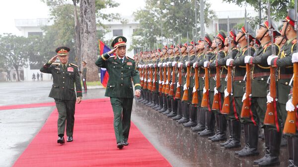 Bộ trưởng Bộ Quốc phòng Phan Văn Giang thăm và làm việc tại Lào - Sputnik Việt Nam